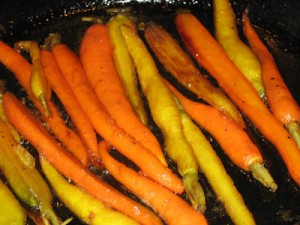 -10054-2 carrots sizzling away in some butter and olive oil with maple syrup